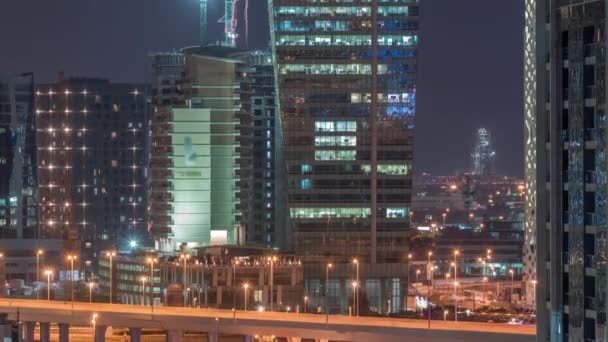 Luzes bonitas em Dubai com a construção de timelapse aérea — Vídeo de Stock