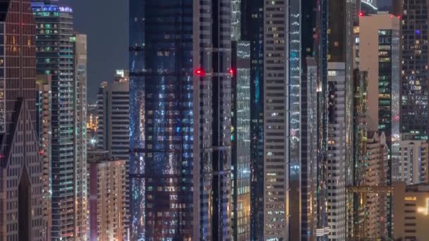 Dubai International Financial Centre district met moderne wolkenkrabbers Night timelapse — Stockvideo