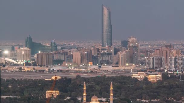 Vista aérea para Dubai Creek com a cidade do festival após o pôr do sol timelapse — Vídeo de Stock
