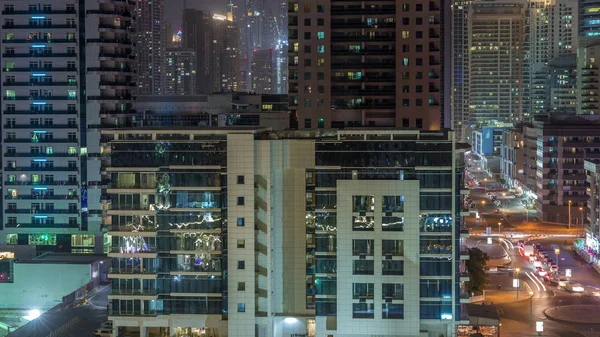 Dubai Marina skyscrapers and promenade aerial night timelapse, Dubai, United Arab Emirates — Stock Photo, Image
