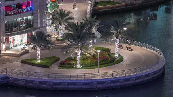 Waterfront promenade in Dubai Marina aerial night timelapse. Dubai, United Arab Emirates — Stock Photo, Image