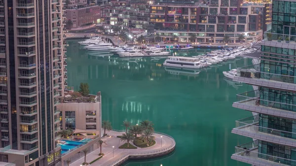 Waterfront promenade in Dubai Marina aerial night to day timelapse. Dubai, United Arab Emirates — Stock Photo, Image