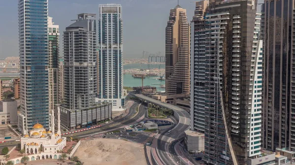 View of various skyscrapers and towers in Dubai Marina from above aerial timelapse — Stock Photo, Image