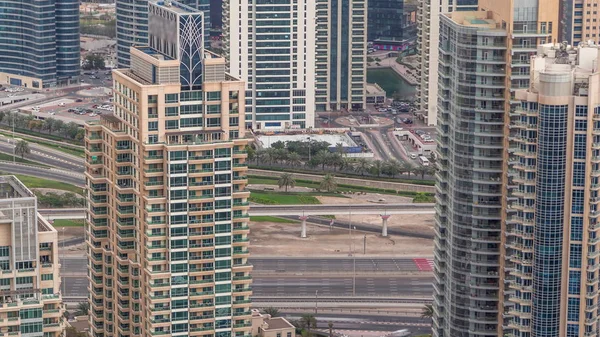 Ντουμπάι Marina ουρανοξύστες και jumeirah λίμνη πύργους θέα από την κορυφή εναέρια timelapse στα Ηνωμένα Αραβικά Εμιράτα. — Φωτογραφία Αρχείου
