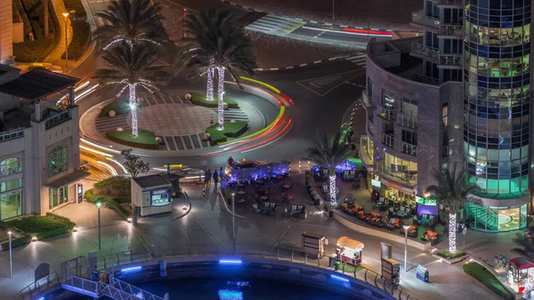Paseo marítimo en Dubai Marina timelapse noche aérea. Dubai, Emiratos Árabes Unidos —  Fotos de Stock