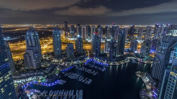 Dubai Marina skyscrapers and jumeirah Lake tower view from the top air night timelapse in the United Arab Emirates. — стокове фото