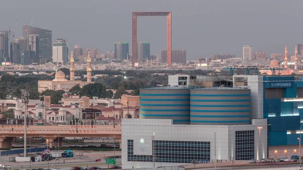 El ritmo de Dubai al atardecer día a noche transición aérea timelapse —  Fotos de Stock