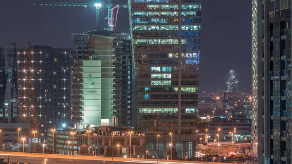 Hermosas luces en Dubai con la construcción de timelapse aéreo —  Fotos de Stock