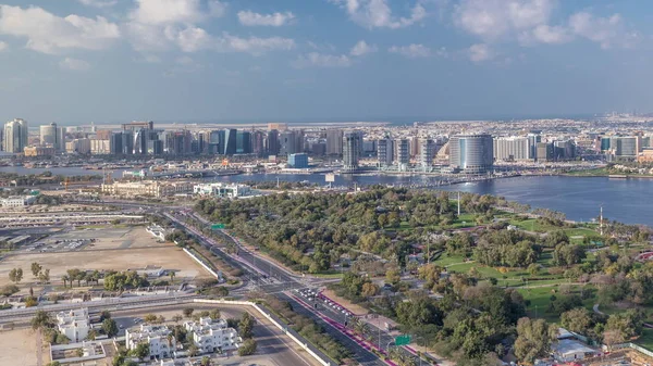 View of new modern buildings at sunny day in luxury Dubai city, Egyesült Arab Emírségek Timelapse Aerial — Stock Fotó