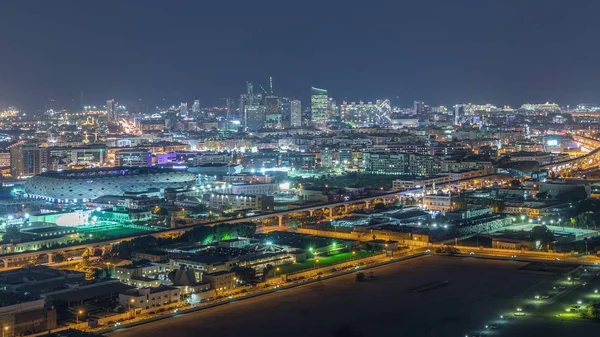 The rhythm of the city at night with illuminated road in Dubai near canal aerial timelapse — Stock Photo, Image