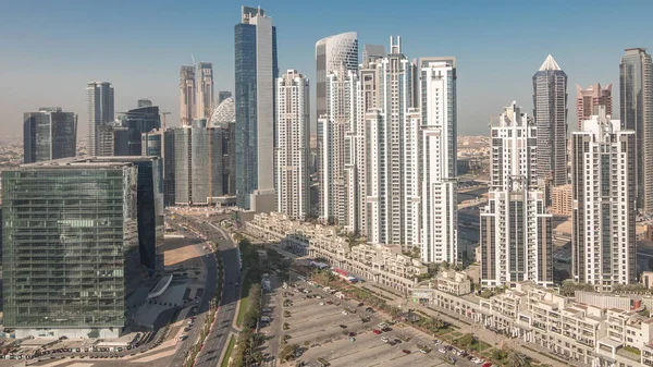 Panorama de Business bay Dubai noche al día timelapse aéreo . —  Fotos de Stock