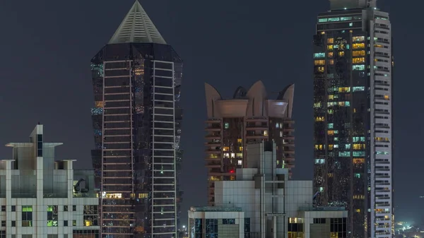 Éjszakai kilátás fények felhőkarcolók este Dubai légi időbeosztás — Stock Fotó