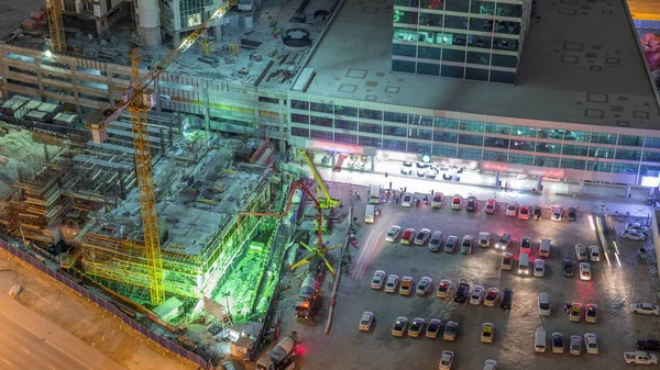 Vista aérea da construção com máquinas especiais em Business Bay, Dubai timelapse — Fotografia de Stock