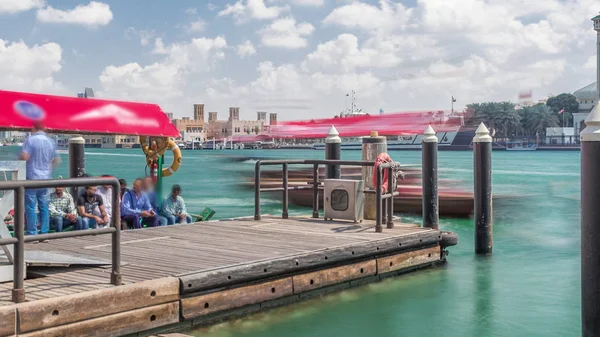 A water taxi boat station in Deira timelapse.