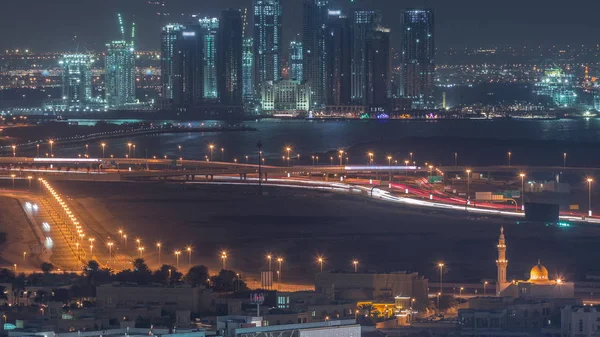 Bouw van nieuwe wolkenkrabbers in Dubai Creek Harbor Aerial Night timelapse. Dubai-Verenigde Arabische Emiraten. — Stockfoto