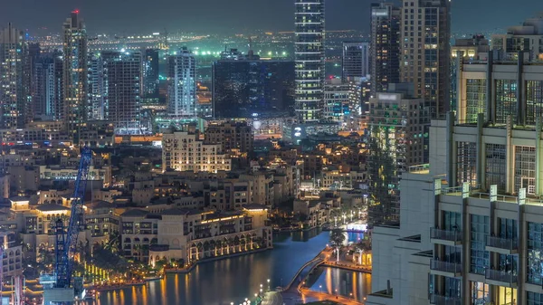 Niesamowity widok z lotu ptaka Dubai Downtown wieżowce Night timelapse, Dubaj, Zjednoczone Emiraty Arabskie — Zdjęcie stockowe