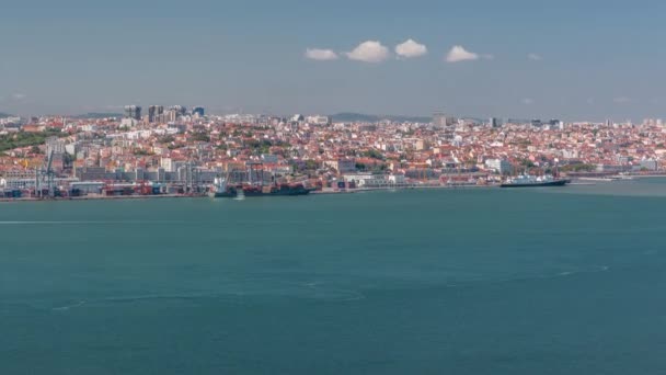 Panorama of Lisbon historical centre aerial timelapse viewed from above the southern margin of the Tagus or Tejo River. — Stock Video