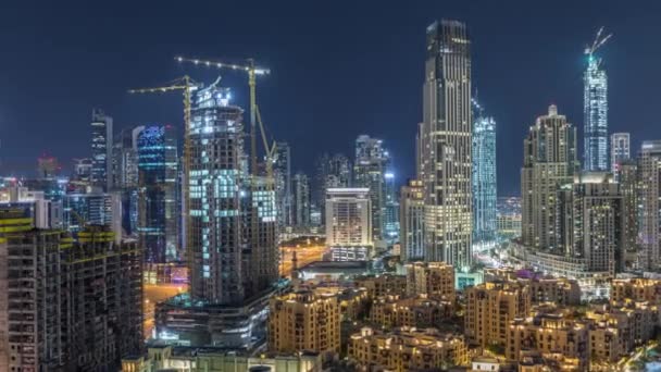 Hermoso horizonte del centro de Dubái y la bahía de negocios con arquitectura moderna noche timelapse . — Vídeos de Stock
