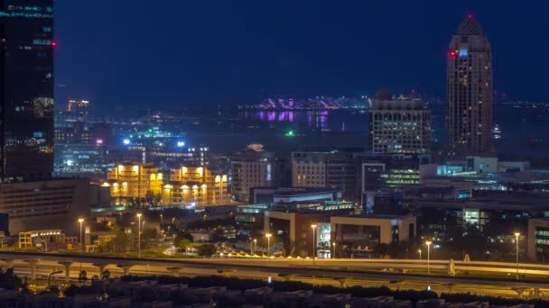 Dubai media city grattacieli notte per giorno timelapse, Dubai, Emirati Arabi Uniti — Video Stock