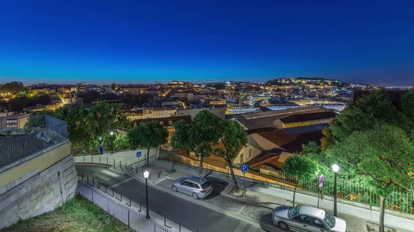 Lisbona aerea paesaggio urbano skyline notte per giorno timelapse dal punto di vista di San Pietro d'Alcantara, Portogallo — Foto Stock