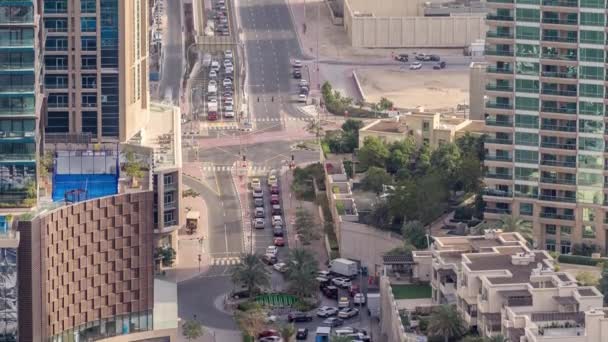 Aerial view of a road intersection in a big city timelapse. — Stock Video