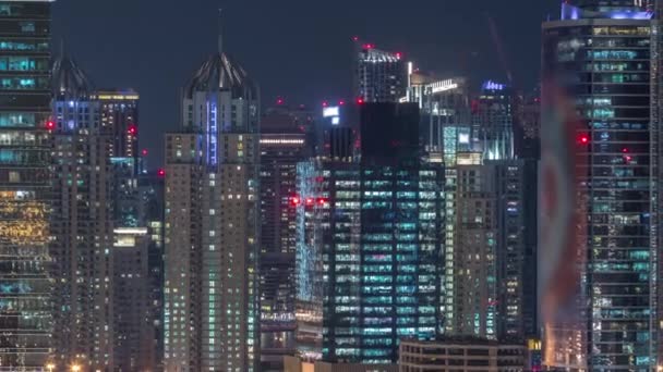 Dubai Marina és jlt légi este TimeLapse kilátás a felhőkarcolók a Dubai, UAE. — Stock videók