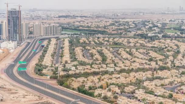 Aerial view of apartment houses and villas in Dubai city timelapse, United Arab Emirates — Stock Video