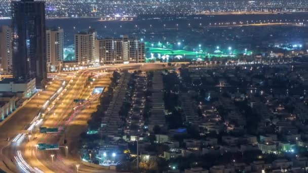 Luftaufnahme von Wohnhäusern und Villen in Dubai Stadt Nacht Zeitraffer, vereinigte arabische Emirate — Stockvideo