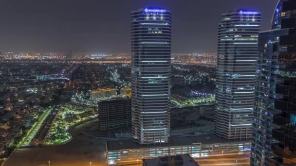 Jumeirah Lake Towers barrio residencial timelapse noche aérea cerca de Dubai Marina — Vídeos de Stock