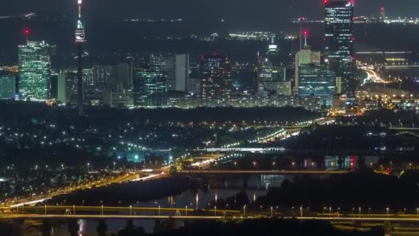 Skyline of Vienna from Danube Viewpoint Leopoldsberg aerial night timelapse. — Stock Video