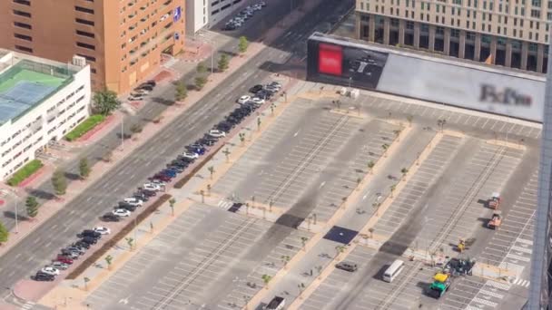 Car parking lot viewed from above timelapse, Aerial top view. Dubai, UAE — Stock Video