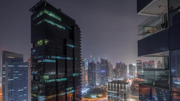 Edifici residenziali e per uffici a Jumeirah lago torri distretto notte timelapse a Dubai — Video Stock