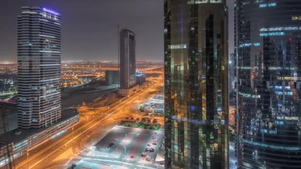 Kantoorgebouwen in Jumeirah Lake Towers district Night timelapse in Dubai — Stockvideo