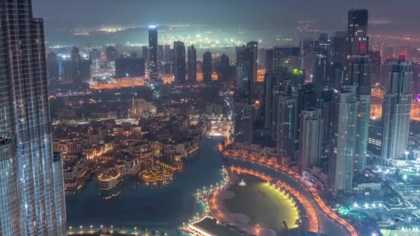 ドバイのダウンタウンの高層ビルの素晴らしい航空写真夜から昼間のタイムラプス、ドバイ、アラブ首長国連邦 — ストック動画