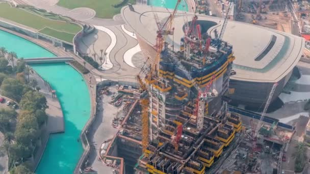 Budowa nowego nowoczesnego wieżowca w Dubai City aerial timelapse, Zjednoczone Emiraty Arabskie — Wideo stockowe