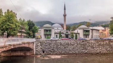 Beautiful view of the Emperors Mosque in Sarajevo on the banks of the Milyacka River timelapse hyperlapse, Bosnia and Herzegovina
