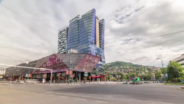 Skyscrapers and shopping mall with large luminous screen in Sarajevo City Center timelapse hyperlapse — Stock Video