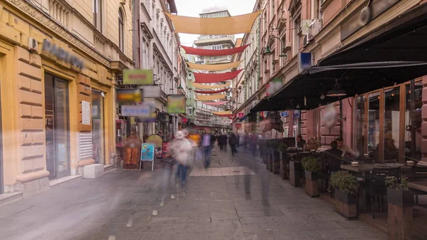 Walk on Ferhadija pedestrian street crowded with people timelapse hyperlapse