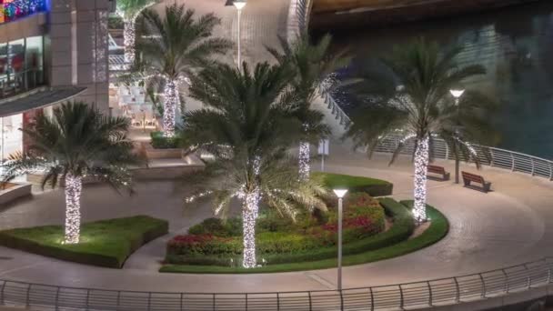 Vízparti sétány Dubai Marina légi éjszakai időzóna. Dubai, Egyesült Arab Emírségek — Stock videók