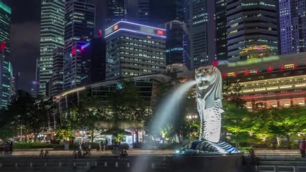 De Merlion fontein en Singapore skyline nacht timelapse hyperlapse. — Stockvideo