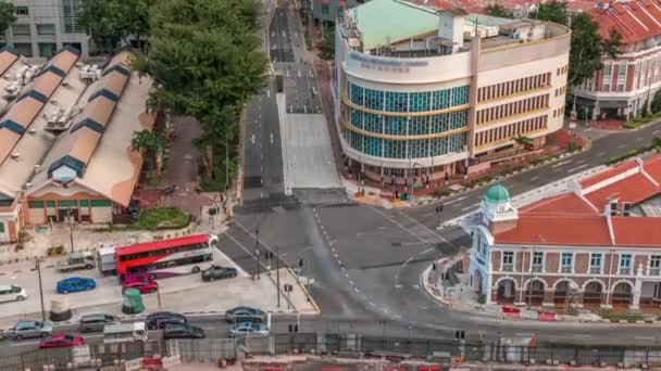 Aerial view of intersection and art deco shophouses along Neil road in Chinatown area timelapse — Stock Video