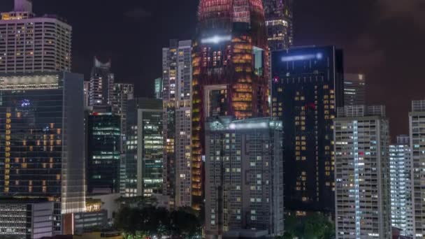 Aerial Cityscape of Singapore centrum nowoczesnej architektury z drapaczy chmur nocy timelapse — Wideo stockowe