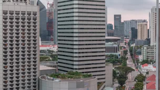 Βραδινό πανόραμα με την περιοχή Marina Bay και ουρανοξύστες πόλη ορίζοντα εναέρια timelapse. — Αρχείο Βίντεο