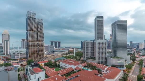 Panorama noturno com área de Marina Bay e arranha-céus cidade horizonte aéreo dia a noite timelapse . — Vídeo de Stock