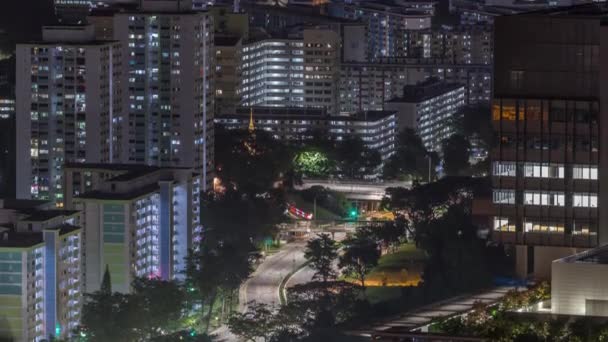 Skyline aéreo con edificios de apartamentos y rascacielos de Singapur noche timelapse — Vídeo de stock