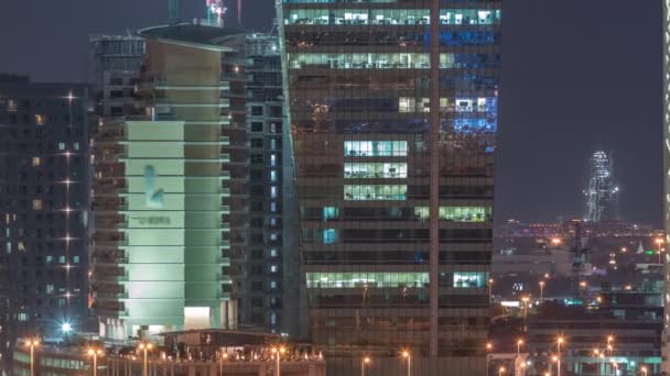 Hermosas luces en Dubai con la construcción de timelapse aéreo — Vídeo de stock