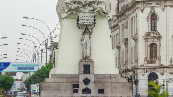 Monument to Jose de San Martin on the Plaza San Martin timelapse hyperlapse in Lima, Peru. Nicolas de Pierola avenue traffic and historic buildings on a background