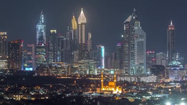 El ritmo de la ciudad de Dubai en el timelapse nocturno — Vídeos de Stock