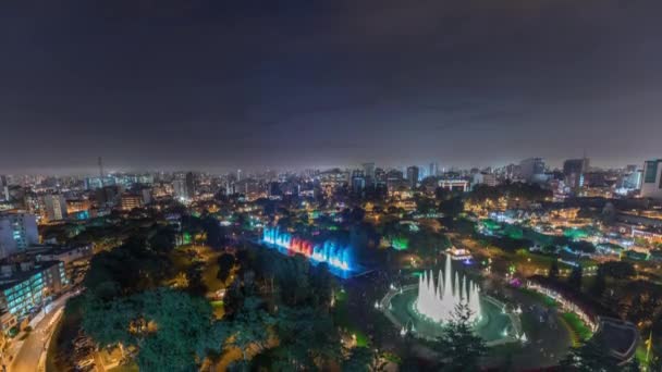 Aerial view to Park of the Reserve with colorful magic water circuit biggest fountain complex night timelapse — Stock Video