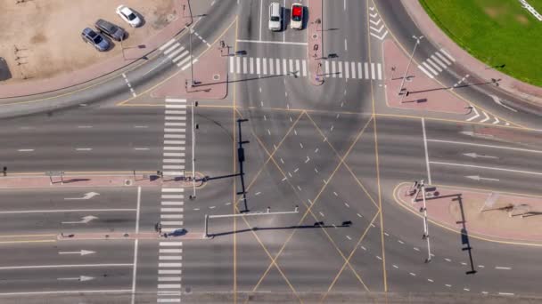 Top view city traffic on a crossroad in Dubai Business bay timelapse. — Stock Video